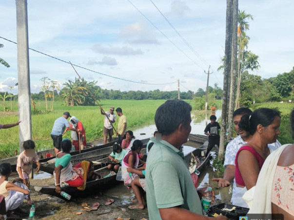 Help flood-affected families in Assam get relief support