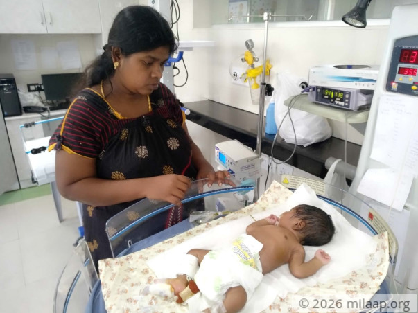 Arathi's six day old baby is in a critical state in the ICU