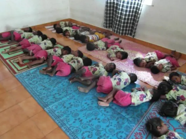 Gift beds,books & bags to our Hostel Children