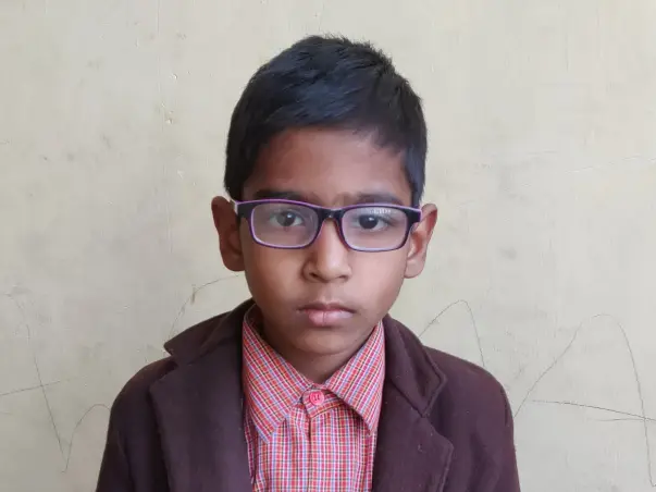 Help a visually challenged  single  mother pay school fees of her son