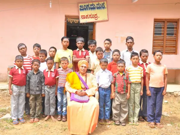 Raise hands against illiteracy, Raise hands against hunger.