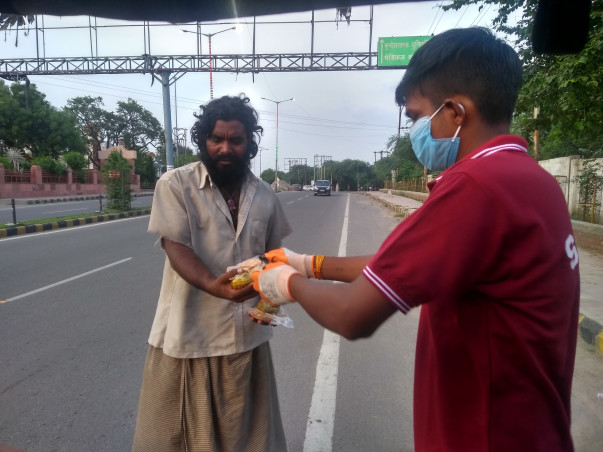 Distributing foods to Poor's and needy people. Feeding hungry stomach.