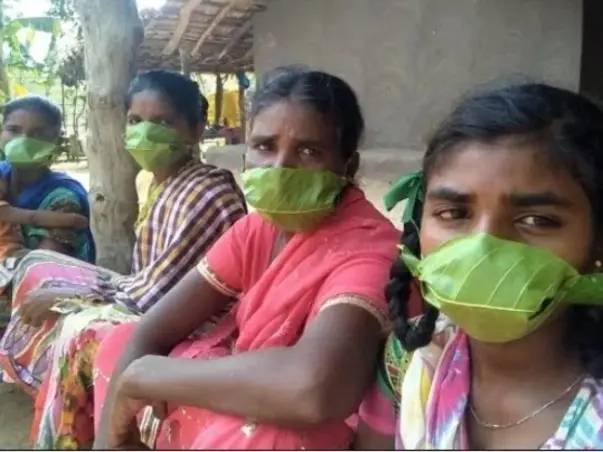 Provide Weaved Masks and Hand sanitizers to people in slums