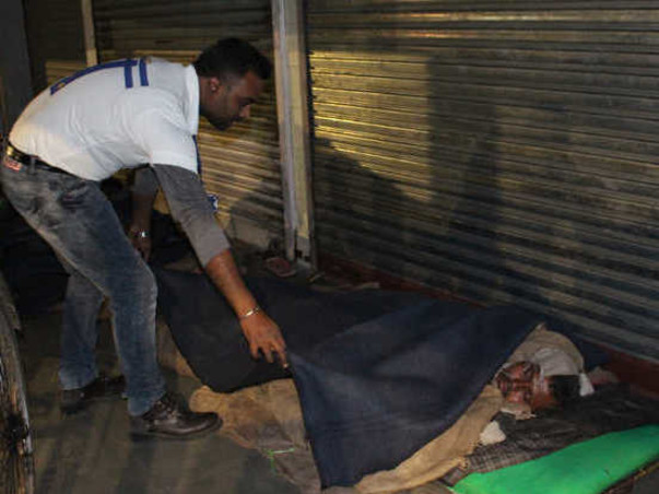 Helping Poor With Warm Blankets And Sweaters