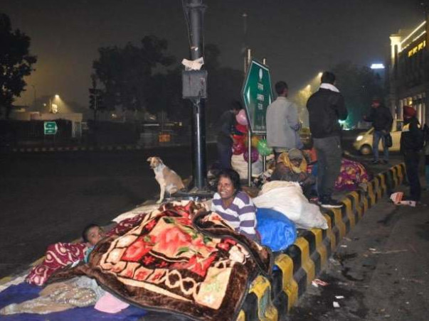 Helping Poor With Warm Blankets And Sweaters