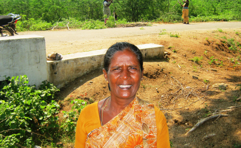 Kasiyammal standing at the NREGA work place of her village