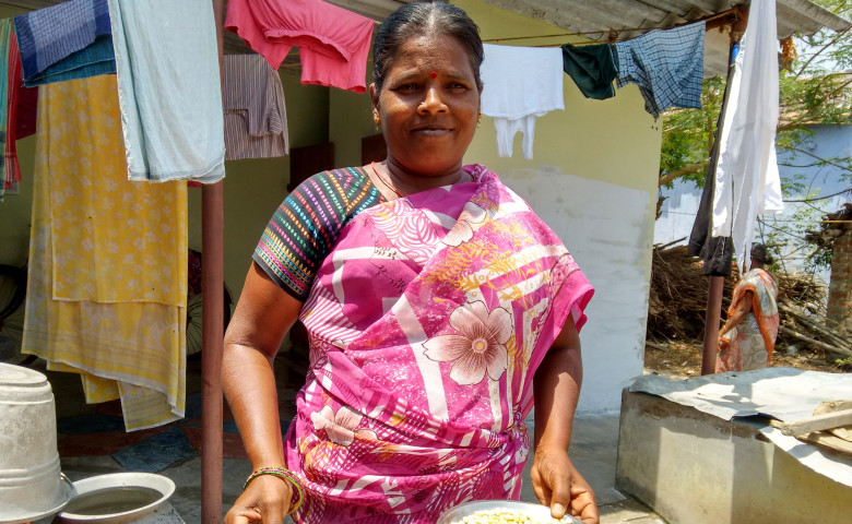 Mariyayee poses with some of the ingredients of her millet-based powder