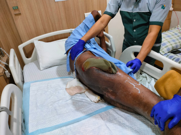 Support Tuhin (a budding scientist) to recover from a truck accident and able to walk again.