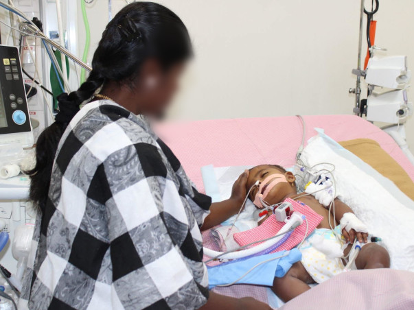 Critical In The ICU, 10-Month-Old Who Hasn’t Opened Her Eyes In A Week