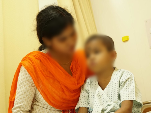 Miles Away From Home, They're Struggling To Save Their Son From Cancer