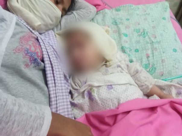 6 months Baby with "Water on the Brain"